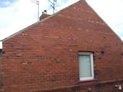 Severe cracking and movement to the gable elevation of a house a result of wall tie corrosion