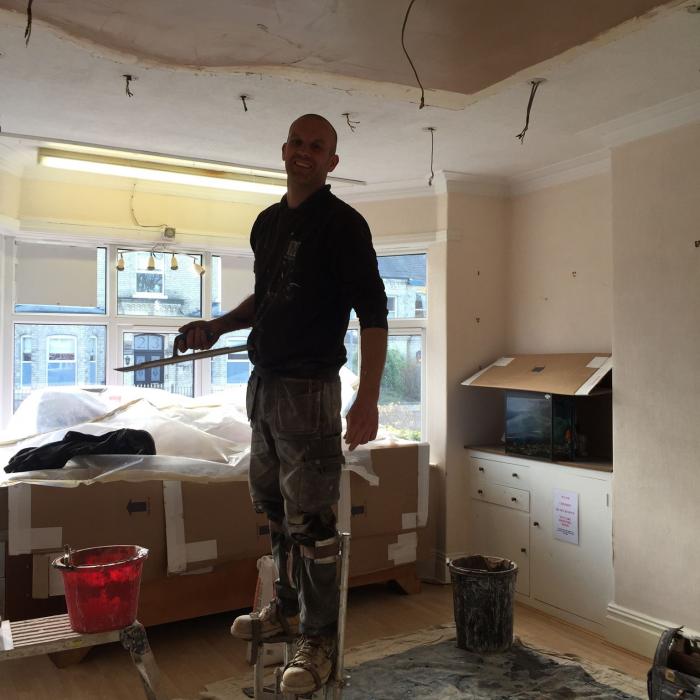 Our top plaster Steve undertaking repairs to this traditionally plastered lath and lime ceiling. Our staff aren't just remedial technicians, they're top tradesmen too! 