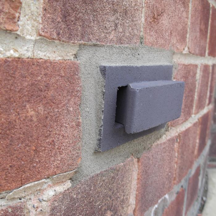 The Dutch/Holland damp proof course system, probably the ugliest and most unreliable system ever invented. To read an independent review of the Holland system read our blog.  
Unfortunately this client had these to installed to resolve a rising damp problem in a bay window as advised by the makers of the system Holland. In the end the system did not work as they had said it would. Why? Because the wall did not have rising damp, it was condensation. Unfortunately he had to go through the unnecessary expense of installing these ugly bricks into his house and wasting his money before getting the correct advice from us....

