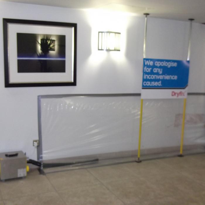 A water damaged wall caused by a leaking bathroom on the opposite side is being dried using a closed drying system using specialist desiccant dehumidifiers in a public building. Using our advanced drying systems we were able to salvage the plaster and reduce drying times dramatically saving our client the expense of reinstating the plaster and decor and a reduction in drying costs. 